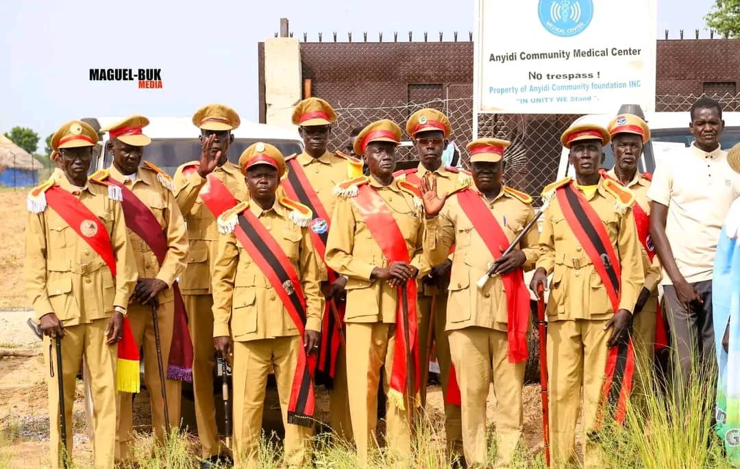Anyidi community leaders gathered outdoors