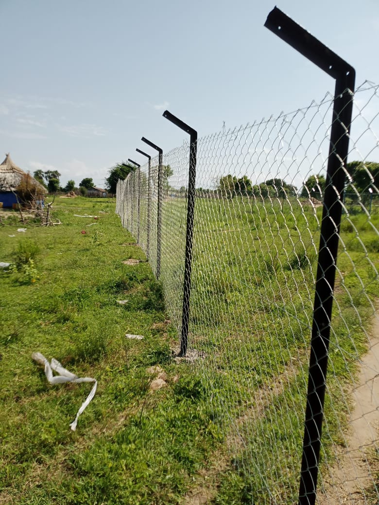 New perimeter fence around a community project site